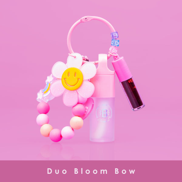 Duo Bloom Bow | Gloss Llavero con Flor Sonriente de Bloomshell