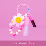 Duo Bloom Bow | Gloss Llavero con Flor Sonriente de Bloomshell